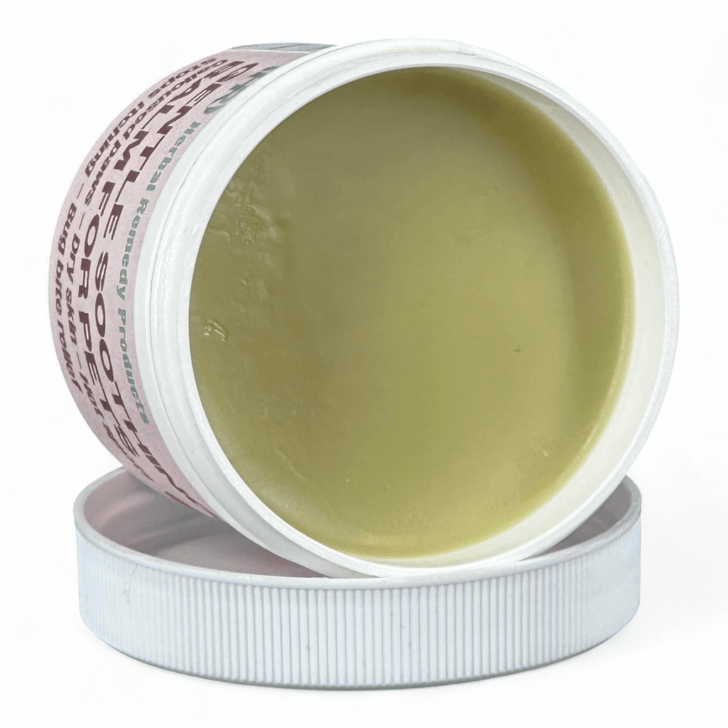 Open jar of cream with visible label on a white background